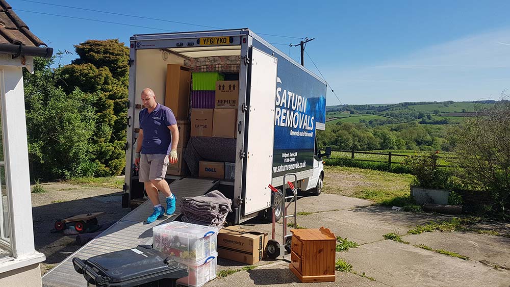 Saturn Removals unloading a residential move in rural Dorset